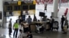 Ruang kedatangan internasional di Bandara Internasional Ngurah Rai, Tuban, dekat Denpasar, Bali, 16 Februari 2022.(SONNY TUMBELAKA / AFP)
