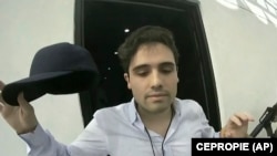 FILE - This video screen grab provided by the Mexican government shows Ovidio Guzman Lopez at the moment of his detention, in Culiacan, Mexico, Oct. 17, 2019. After authorities were forced to release Guzman in 2019, the Mexican military captured him on Jan. 5, 2023.