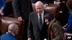 Senate Majority Leader Chuck Schumer, left, speaks with Senate Appropriations Committee Chair Patrick Leahy and Rep. Rosa DeLauro, the House Appropriations Committee chair, as they await Ukrainian President Volodymyr Zelenskyy at the Capitol in Washington, Dec. 21, 2022.