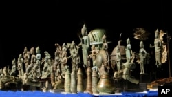 Eighty-five artifacts are displayed before the handover ceremony at the National Museum, in Phnom Penh, Cambodia, Friday, July 5, 2019. Millennium-old Cambodian artifacts displayed in a Japanese collector’s home for two decades have been returned to…