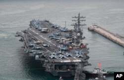 美國海軍羅納德·裡根號航母駛離韓國釜山海軍基地。 （2022年9月26日）