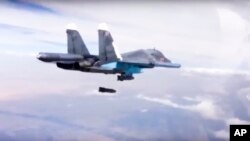 Foto de archivo de un bombardero Su-34 como los que despegaron de un aeródromo iraní para atacar en Siria.