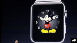 FILE - Apple CEO Tim Cook talks about the new Apple Watch during an Apple event on March 9, 2015, in San Francisco. 