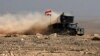 Iraqi special forces advance in western Mosul, Iraq, Feb. 24, 2017. 