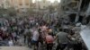 Palestinianos retiram sobreviventes de escombros depois de ataque israelita em Gaza