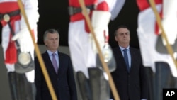 Los presidentes Mauricio Macri y Jair Bolsonaro se mostraron de acuerdo en unirse a Estados Unidos en el aumento de la presión por un cambio democrático en Venezuela.