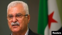FILE - George Sabra, a veteran Christian opposition figure. His brother, Mahmoud, was arrested in Syria last week.