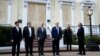 Presiden Donald Trump bersama Menteri Pertahanan Mark Esper, Jaksa Agung William Barr dan para pejabat lainnya berfoto di depan Gereja St. John, di Washington, 1 Juni 2020. 