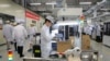 FILE - A phone production line is pictured at a Huawei factory in Dongguan, China, March 6, 2019. China's state media this week announced Chinese electrical appliance manufacturer Midea Group jointly built its first overseas 5G factory in Thailand with Huawei and other firms. 