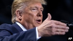 El presidente Donald Trump habla en un mitin en Battle Creek, Michigan, el 18 de diciembre de 2019. 