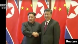習近平會見金正恩（2018年3月北京）