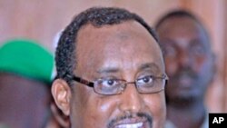 Somalia's Prime Minister Abdiweli Mohamed Ali addresses a news conference in the capital Mogadishu. Mohamed Ali was given the job full-time on Thursday by President Sheikh Sharif Ahmed and will form a government whose goal will be to quash a rebellion, Ju