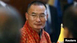 FILE - Bhutan's Prime Minister Tshering Tobgay looks on during a meeting with Sri Lanka's President Maithripala Sirisena (not pictured) in Colombo, April 10, 2015.