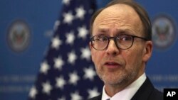 FILE - In this file photo taken on Nov. 9, 2016, U.S. Ambassador to Iraq Douglas Silliman speaks to the press during a gathering to watch U.S. election results in Baghdad.