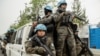 Membros da MONUSCO asseguram a evacuação do pessoal não essencial da ONU, na sequência do combate entre os rebeldes M23 e as FARDC, em Goma.