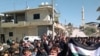 International Aid Workers and Diplomats Press Syria on Crisis