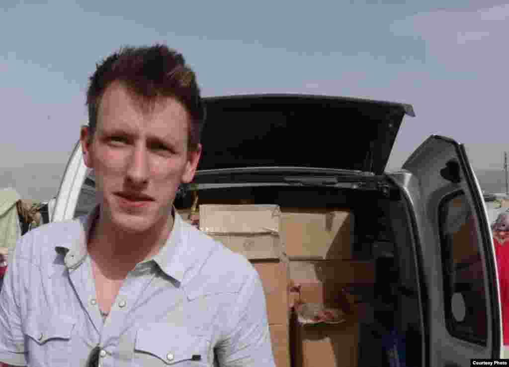 Abdul-Rahman (Peter) Kassig, an American aid worker, making a food delivery to refugees in Lebanon’s Bekaa Valley, May 2013. (Copyright, with permission to use from Kassig family)