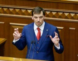 Ukraine's newly elected Prime Minister Oleksiy Honcharuk speaks during a parliament session in Kyiv, Ukraine, Aug. 29, 2019.Honcharuk speaks during parliament session in Kyiv, Ukraine, Aug. 29, 2019.