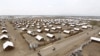 FILE - An aerial view shows houses at the Kakuma refugee camp in Turkana District, northwest of Kenya's capital Nairobi, June 20, 2015. A malaria outbreak in the nearby Kalobeyei refugee complex has killed at least 4 people.