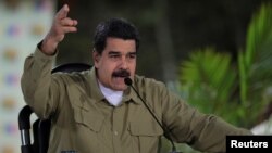 Venezuela's President Nicolas Maduro speaks during his weekly broadcast "Los Domingos con Maduro" (The Sundays with Maduro) in Caracas, Venezuela Aug. 6, 2017. 