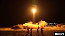 A photo distributed by the Houthi Military Media Unit shows what it claimed was a launch by Houthi forces of a ballistic missile aimed at Saudi Arabia March 25, 2018. 