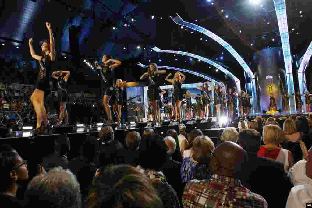 Contestants walk on the runway during the Miss America 2014 pageant in Atlantic City, N.J., Sept. 15, 2013.