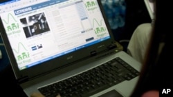 Chak Sopheap, a Cambodian Web log user, or blogger, surfs her blog during the Cambodian Bloggers Summit in Phnom Penh. 