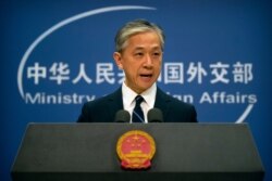 China's Ministry of Foreign Affairs spokesperson Wang Wenbin speaks during a daily briefing at the Ministry of Foreign Affairs in Beijing, July 24, 2020.