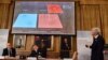 Thomas Hans Hansson (R), one of the members of the Royal Academy of Sciences, speaks during a news conference announcing the winners of the 2016 Nobel Prize for Physics in Stockholm, Sweden, Oct. 4, 2016. 