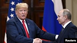 Президенти США і Росії на зустрічі у Гельсінкі 