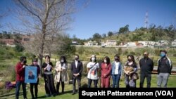 A crowd of dozens of Asian American communities gathers to raise awareness about the increase in hate crimes against Asians in the US near Chinatown Los Angeles, CA. 
