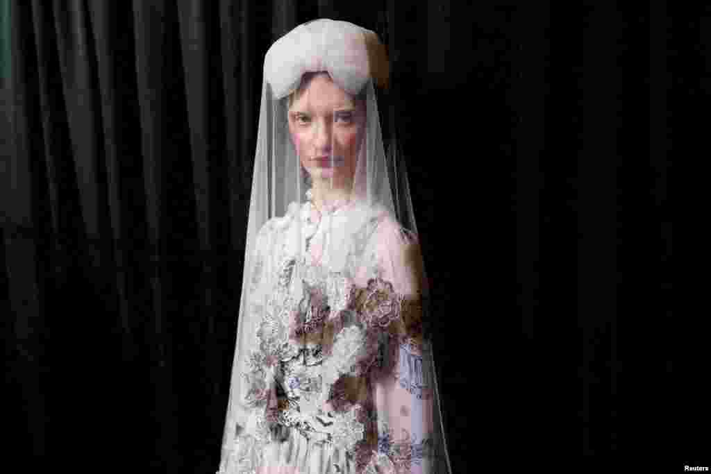 A model poses backstage during preparations for the Bora Aksu show at London Fashion Week in London, Britain. REUTERS/Isabel Infantes