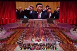Chinese President Xi Jinping is seen leading other top officials pledging their vows to the party on screen during a gala show ahead of the 100th anniversary of the founding of the Chinese Communist Party in Beijing on June 28, 2021.