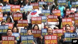 지난해 6월 한국 서울의 시민단체가 탈북자 강제북송 반대 집회를 가졌다. (자료사진)