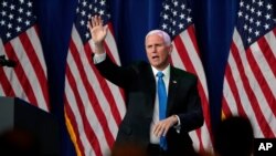 Vice President Mike Pence waves after speaking during the first day of the Republican National Convention, Aug. 24, 2020, in Charlotte, N.C.