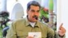 Esta fotografía difundida por la prensa del Palacio de Miraflores muestra al presidente Nicolás Maduro durante una reunión sobre asuntos económicos en Caracas.