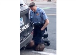 FILE - In this Monday, May 25, 2020, file frame from video provided by Darnella Frazier, a Minneapolis officer kneels on the neck of George Floyd, a handcuffed man who was pleading that he could not breathe. The death of Floyd has renewed scrutiny of immo