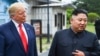 资料照片：金正恩与特朗普在板门店非军事区内会面（2019年6月30号）。