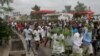FILE - Congolese opposition supporters chant slogans during a march to press President Joseph Kabila to step down in the Democratic Republic of Congo's capital, Kinshasa, Sept. 19, 2016. 