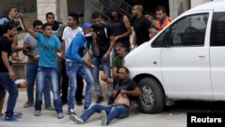 Israeli Forces Clash With Palestinians at West Bank Checkpoint