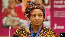 FILE - Yvette Azane Ngwemetoh, of Cameroon, a representative of rural women attends a meeting on occasion of the International Women's Day.