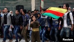 Dîmeneke ji çalakîyeke Kurdan li Sûrîyê (Arşîv)