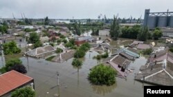Poplavljena mesta nakon uništenja brane Nova Kahovka. (Foto: REUTERS/Vladyslav Smilianets)