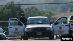 La police de San Diego sur la scène d'un meurtre, à San Diego, Californie, le 29 juillet 2016.