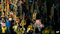 2014年1月1日，香港成千上萬民眾上街要求普選特首。