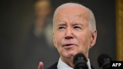 Президент США Джо Байден звертається до американців після підписання закону про допомогу американським союзникам, зокрема 60 млрд дол. для України, Білий дім, Вашингтон, 24 квітня 2024. Photo by Jim WATSON / AFP