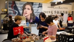 China dice que la reducción de aranceles busca estimular el consumo y la competencia en el país.