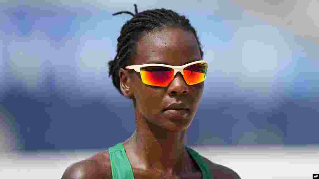 Gaudencia Makokha, of Kenya, competes during a women's beach volleyball match against the United States at the 2020 Summer Olympics, Thursday, July 29, 2021, in Tokyo, Japan. (AP Photo/Petros Giannakouris)