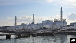The badly damaged Tokyo Electric Power Company (TEPCO) Number 1 Daiichi nuclear power plant at Okuma town in Fukushima prefecture, March 31, 2011