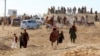 Paktiya viloyatida bir erkakning qatl etilishini tomosha qilishga kelgan omma, Afg'oniston, 13-noyabr, 2024 